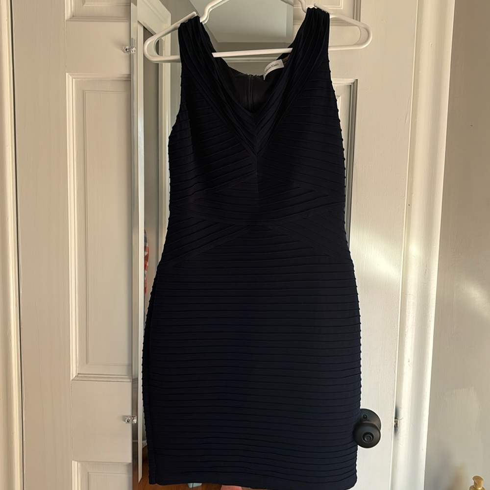 Calvin Klein size 4 body con ribbed navy blue dress.